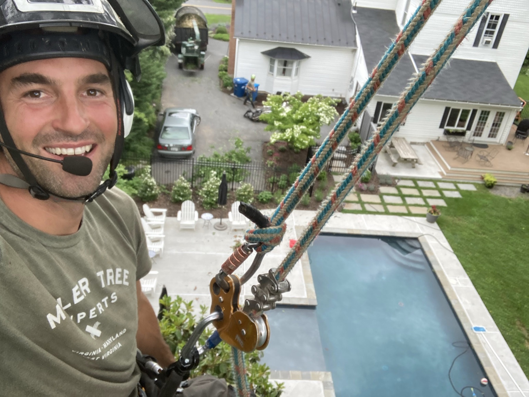 Miller Tree Experts arborist on a residential storm-damage job